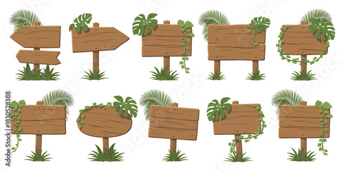 Various wooden tropical signs with lush green foliage and vines