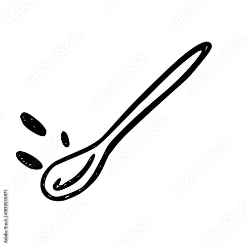 Spoon with drops of coffee