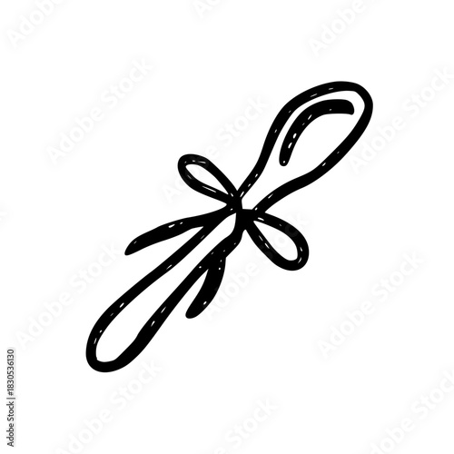 A small spoon with a bow