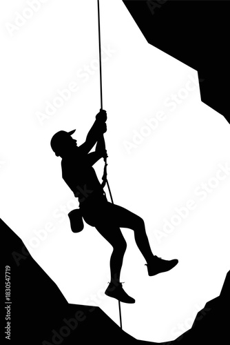 Silhouette of a man rappelling down a cliff face against a bright sky