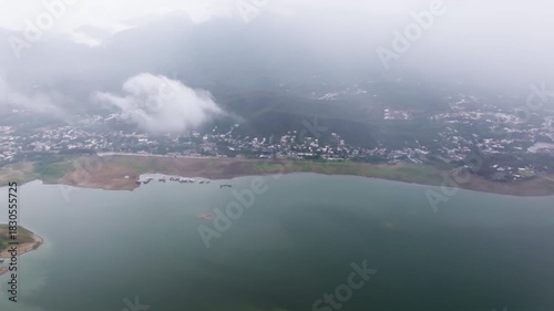 Aerial Flight Through Mist Over Lake with Real Rain Droplets on Lens