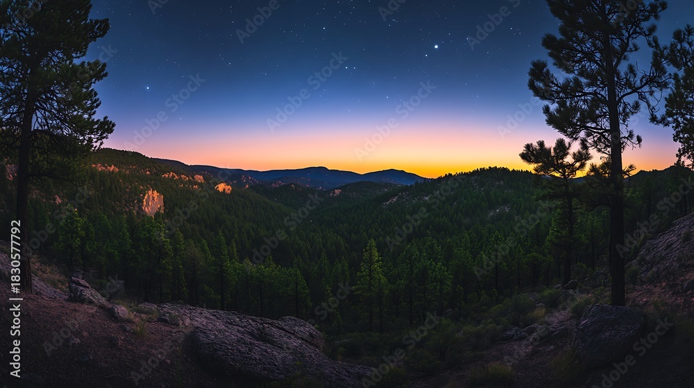 Fototapeta premium Colorful twilight sky over peaceful mountain landscape with layered hills 
