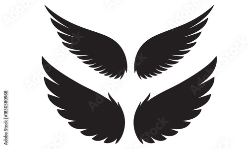 Four black angel wing silhouettes with detailed feather textures