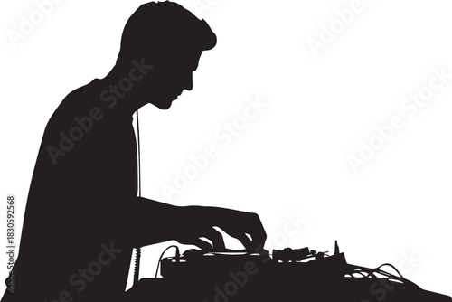 Silhouette of a DJ Mixing Music at a Concert
