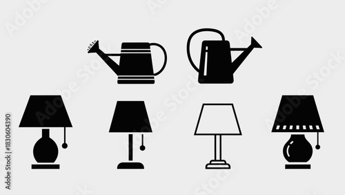 Collection of lamps and watering cans on white background