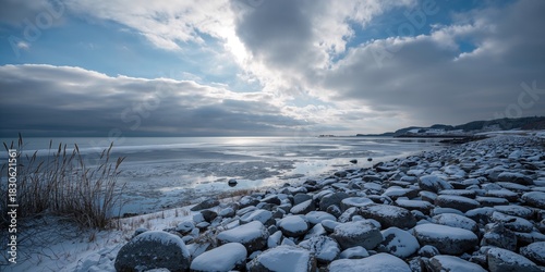 Fototapeta Naklejka Na Ścianę i Meble -  Pastel pink computer setup with a tablet, camera gear, and indoor plants, used as a workspace background for productivity