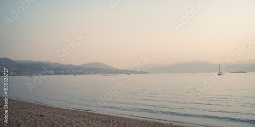 Fototapeta Naklejka Na Ścianę i Meble -  Slug feeding on pumpkin, emphasizing natural feeding behavior during autumn