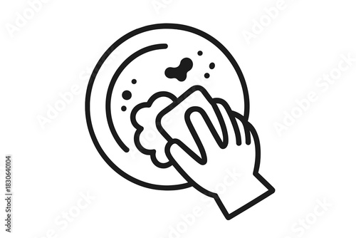 Close-up of a hand scrubbing a dirty plate using a sponge and soapy foam