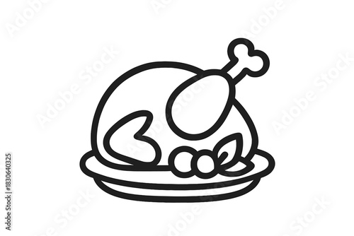 Roasted holiday turkey or chicken served whole on a platter with garnish for dinner celebration