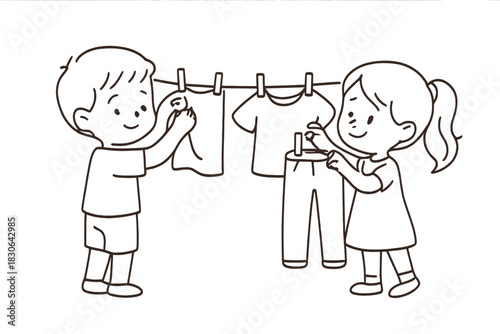Smiling kids using clothespins to hang freshly washed garments on a line