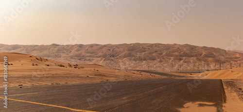 Fototapeta Naklejka Na Ścianę i Meble -  Road to Liwa Dune Desert, UAE, Dec 2025