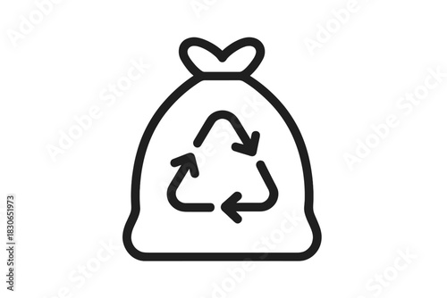 Tied trash bag with universal recycling symbol representing waste disposal and environmental conservation