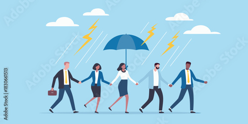 Business team walking together under umbrella during storm protection and support
