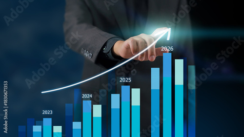 Businessman reviewing balance sheet and virtual data charts. financial analysis concept, strategy planning and growth opportunities, calculating company investment