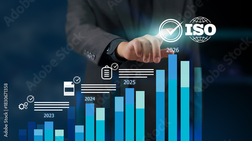 Businessman touching Quality assurance icon on digital screen with check mark icon for ISO certification and standardization. Quality assurance concept.