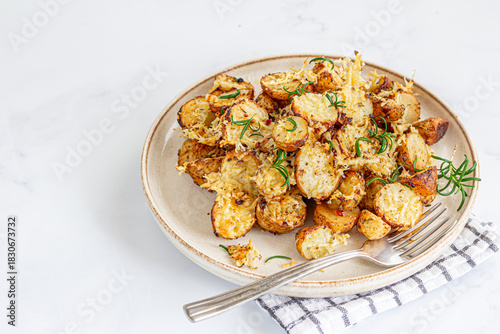Crunchy Oven-Baked Potato Wedges With Condiment Garnished With Fresh Rosemary