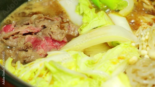 Sukiyaki, a Japanese hot pot dish featuring generous portions of beef and vegetables