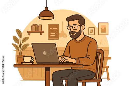 Young bearded man wearing glasses working on a laptop computer inside a modern coffee shop