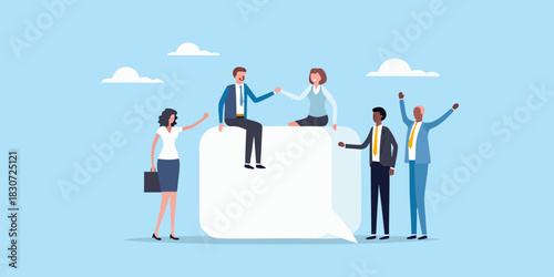 Diverse business team collaborating around a large speech bubble with a blue sky background