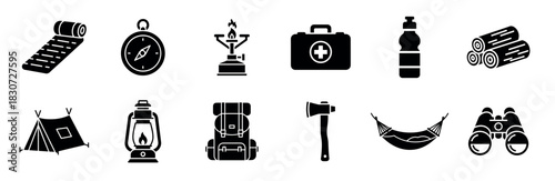 Set of black camping equipment icons featuring a tent, backpack, compass, axe, and lantern for outdoor adventure, survival, and tourism concepts in a minimalist glyph style