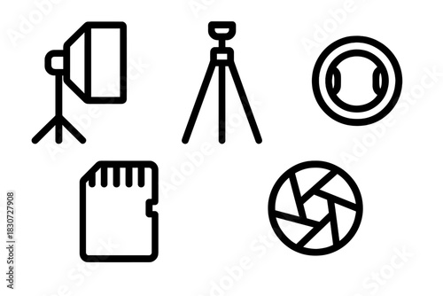 Essential photography equipment featuring studio light, tripod, memory card, and camera lens aperture