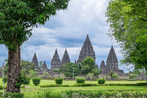 Yogyakarta Indonesia 12 11 2025 – Exterior view of Prambanan, a Hindu temple complex known for its towering shrines and rich heritage. Tourists visiting the temple.