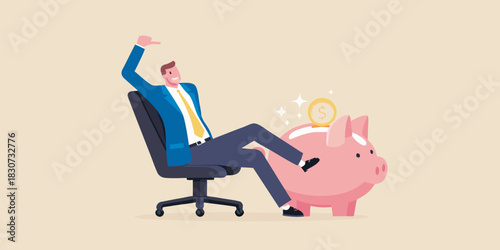 Happy businessman relaxing next to a piggy bank with a coin