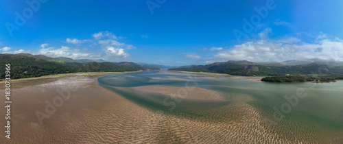 Aerial Photo of Mawddach Estuary Wales UK. The Mawddach Estuary is where the River Mawddach (Afon Mawddach in Welsh) meets the sea and forms a stunning wide sandy estuary.