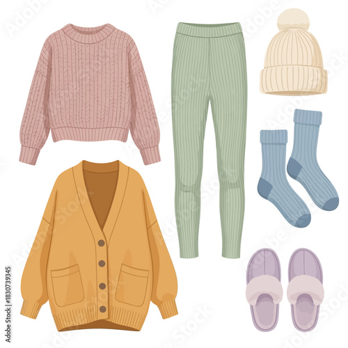 Cozy essentials laid out for a relaxing day indoors featuring soft textures and inviting colors