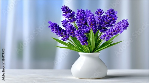 A bouquet of vibrant purple lavender flowers in a white vase, set on a white table with a soft, blurred background.