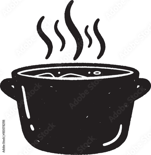 Delicious homemade soup in a pot with steam rising gently