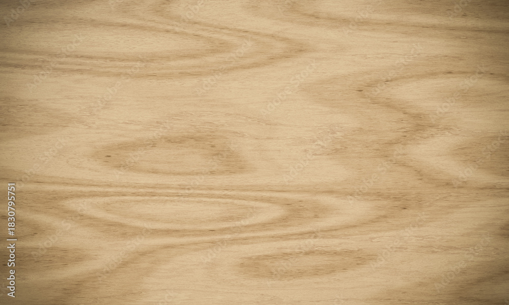 Obraz premium Close-up shot of a light wood background with soft, swirling grain design.
