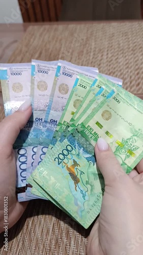 Exploring the beauty of Kazakhstani tenge in a cozy indoor setting
