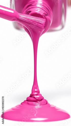 Pouring Pink Nail Polish From Bottle on White Surface, Close Up