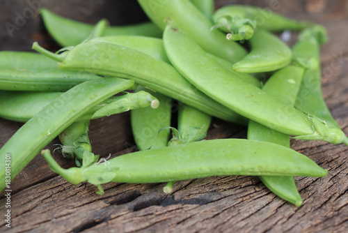 Wallpaper Mural Fresh green peas in wooden bowl close-up Torontodigital.ca