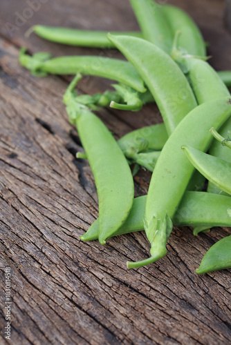 Wallpaper Mural Fresh green peas in wooden bowl close-up Torontodigital.ca