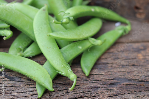 Wallpaper Mural Fresh green peas in wooden bowl close-up Torontodigital.ca