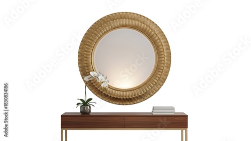 A gold-framed mirror hangs above a wooden console, orchid and books included