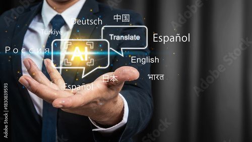 Businessman presenting artificial intelligence language translation above his open hand. Glowing AI logo inside a speech bubble surrounded by several languages
