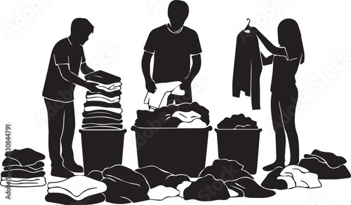 Volunteers sorting donated clothes for international volunteer day charity work concept