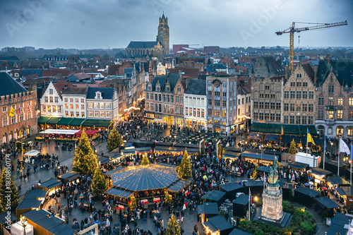 Christmas market decorated and illuminated in Bruges, Belgium. 