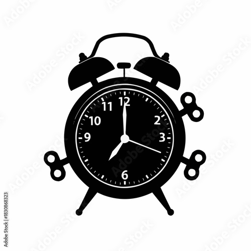 Silhouette of a Vintage Alarm Clock with Wind-Up Keys.