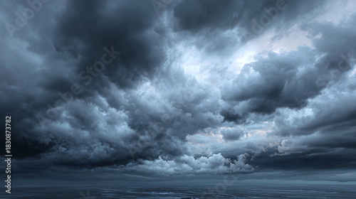 Dramatic storm clouds gathering ominously in the sky, conveying a sense of impending weather