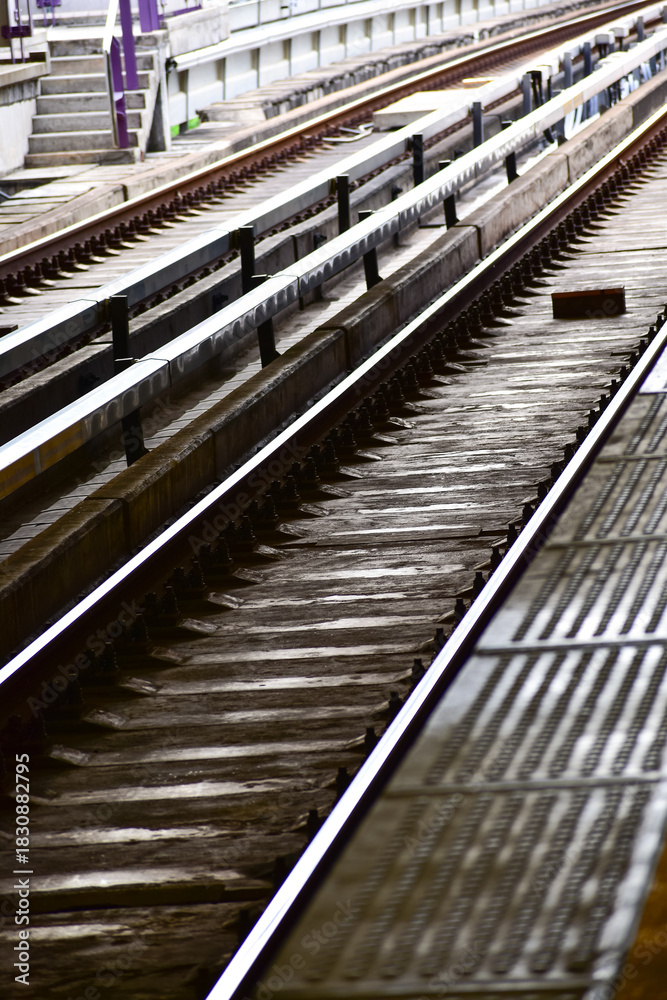 Fototapeta premium Close-up of the rail road in Bangkok, Thailand. Bangkok BTS skytrain rail road. Cityscape, travel and transportation concept.