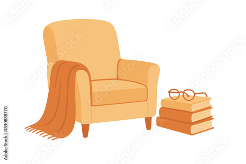Comfortable reading nook setup with armchair, blanket, stacked books, and glasses