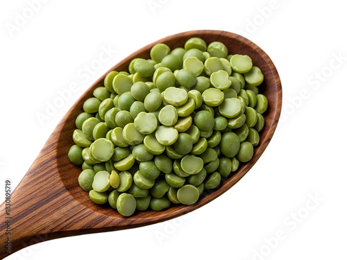 Wooden spoon filled with dried green split peas on black background