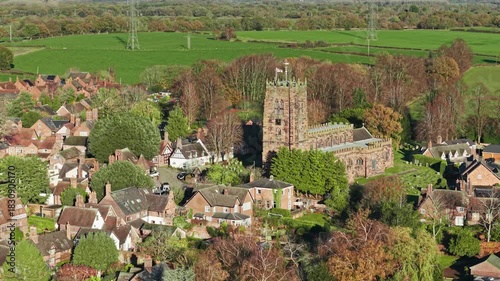 Aerial view of church in Great Budworth village, Cheshire, England