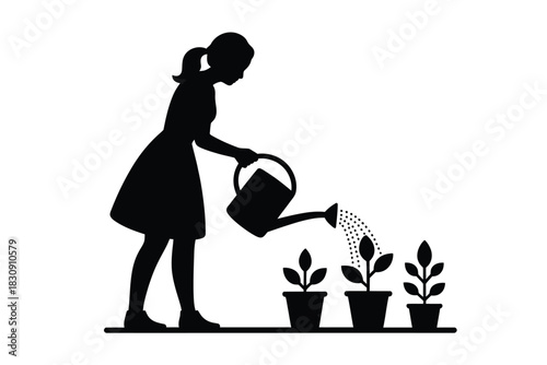 Silhouette of woman watering plants in pots with watering can