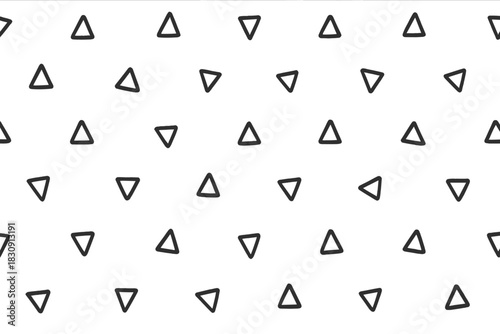 Hand drawn seamless pattern with scattered black triangles on white background