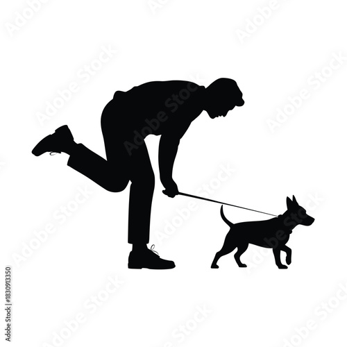 Silhouette of man picking up dog poop with bag on leash